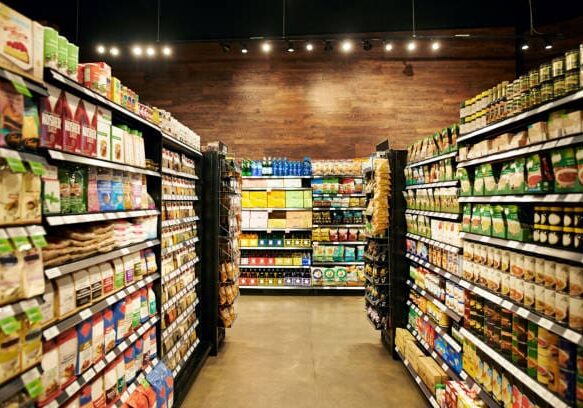 Shot of fully stocked isles in a grocery store during the day